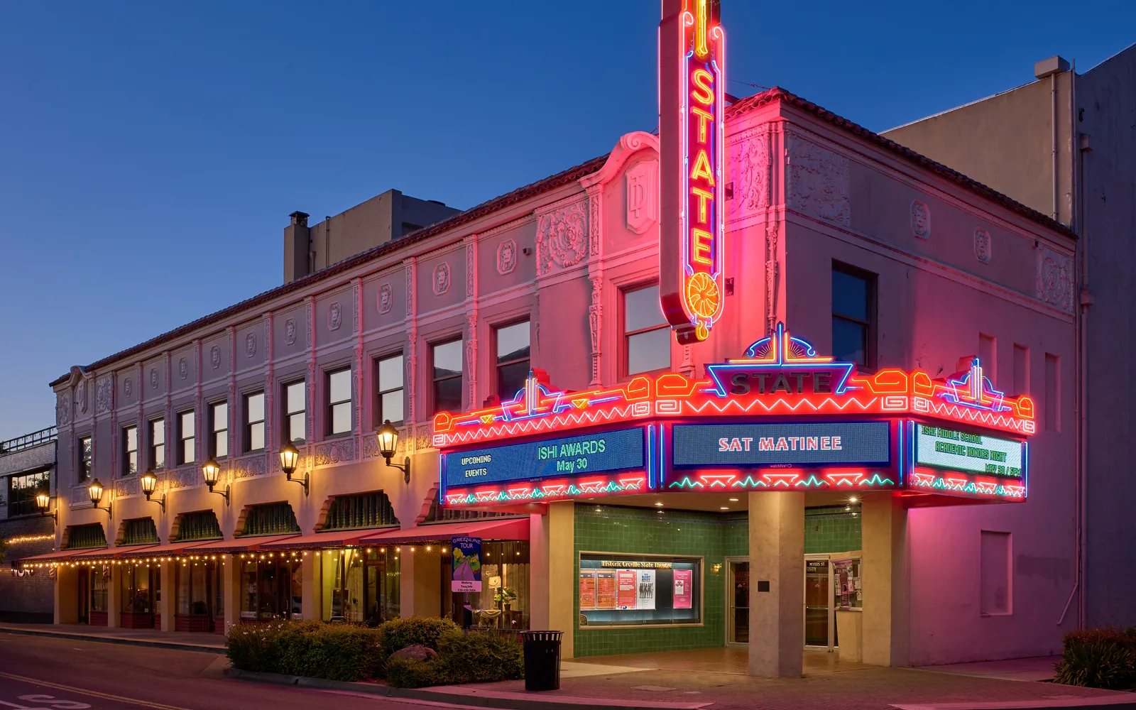 Oroville State Theatre, a historic 1928 building in downtown Oroville, California, photographed during the blue hour with architectural details illuminated